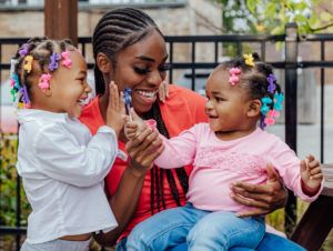 Mom with two happy kids.